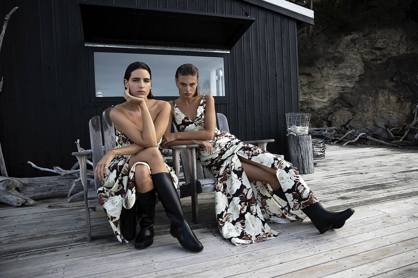 SIR - VIVIENNE GOWN - FLORAL (BYRON BAY) Models posing in chairs with boots