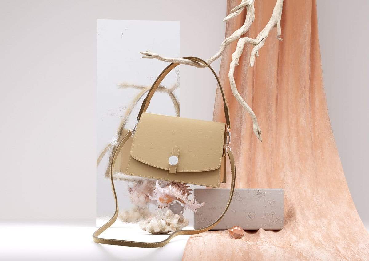 Bag styled with tree branch and shells