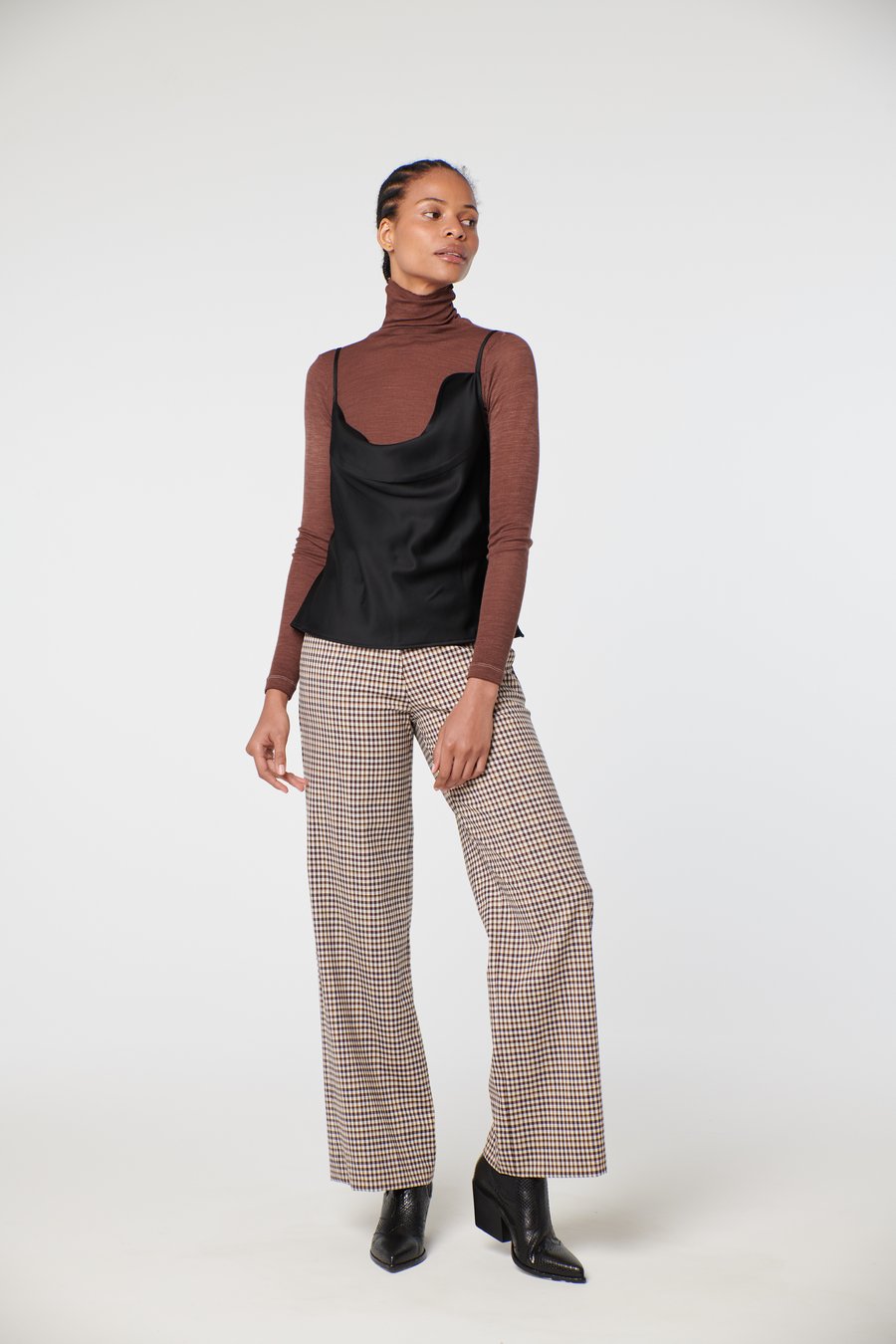 ARNSDORF - SIENA TOP - BLACK Styled with checked pants and brown turtleneck