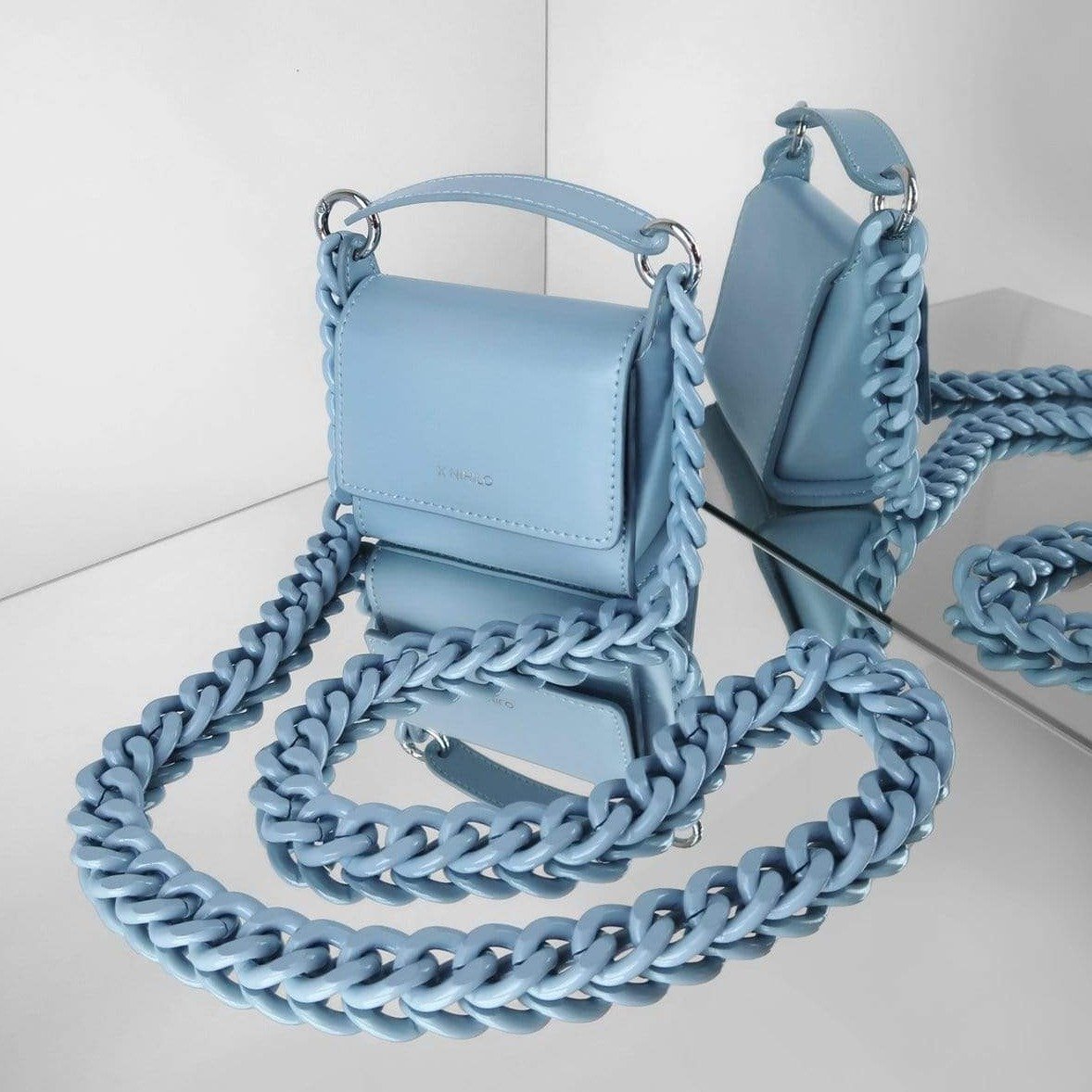X NIHILO - TRANQUIL MINI LEATHER SHOULDER BAG - BLUE Coiled strap