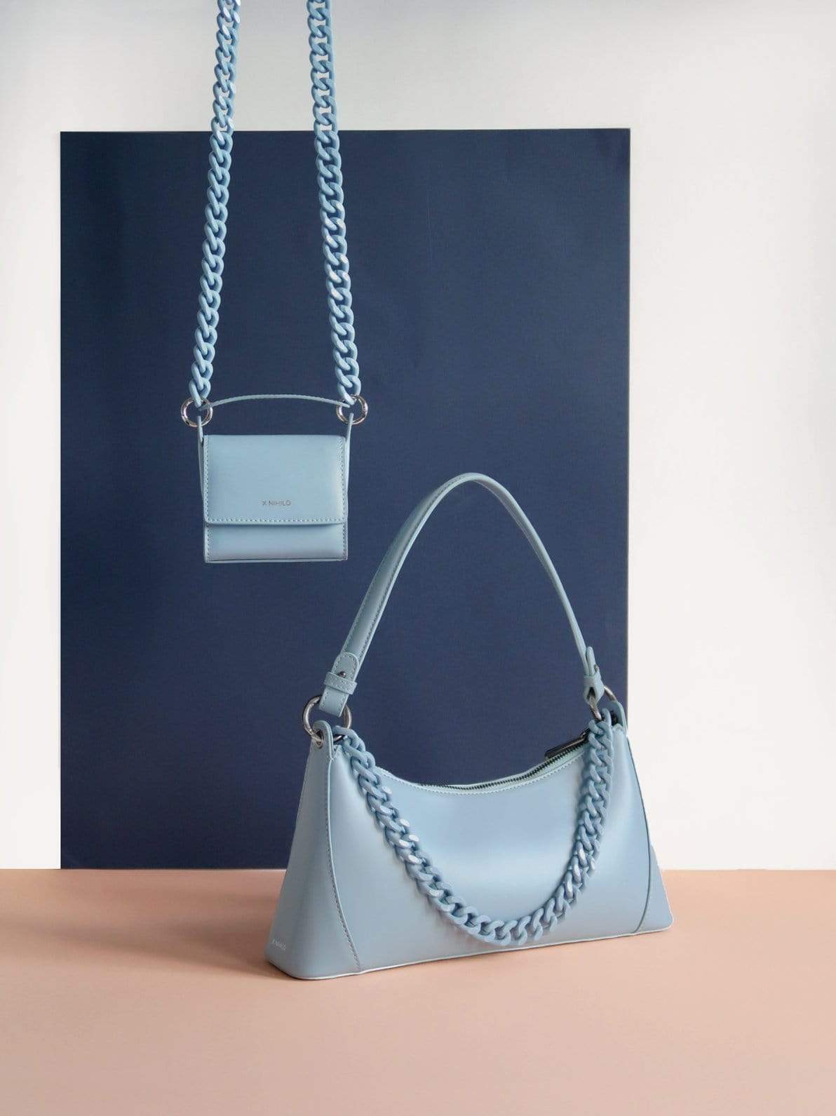 X NIHILO - TRANQUIL MINI LEATHER SHOULDER BAG - BLUE Multiple bag styling 