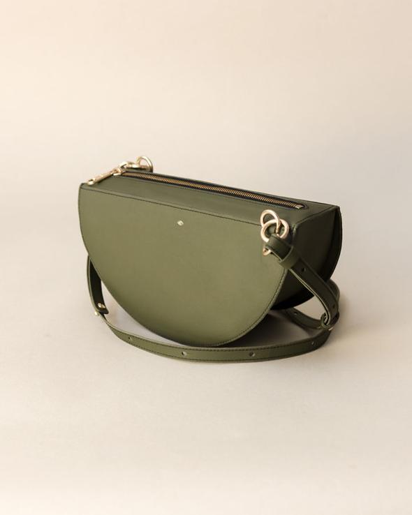 SIMÉTRIE - THICK CRESCENT MOON BAG - GREEN Angled product shot